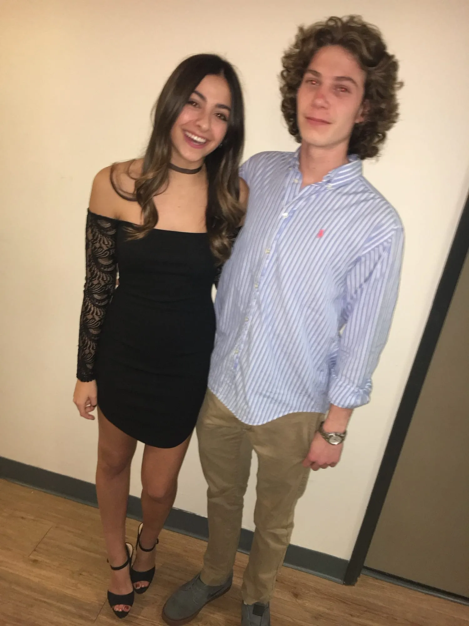 Lauren in a black dress and Ben in a checked shirt, dressed up for a night out