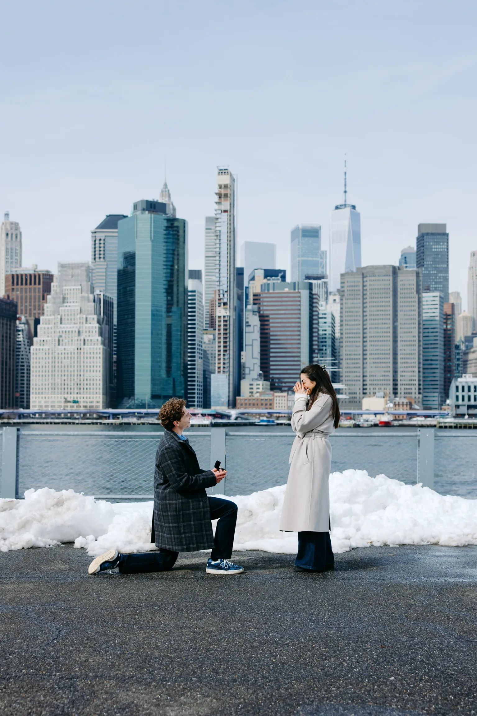 Ben proposing to Lauren in Dumbo, Brooklyn